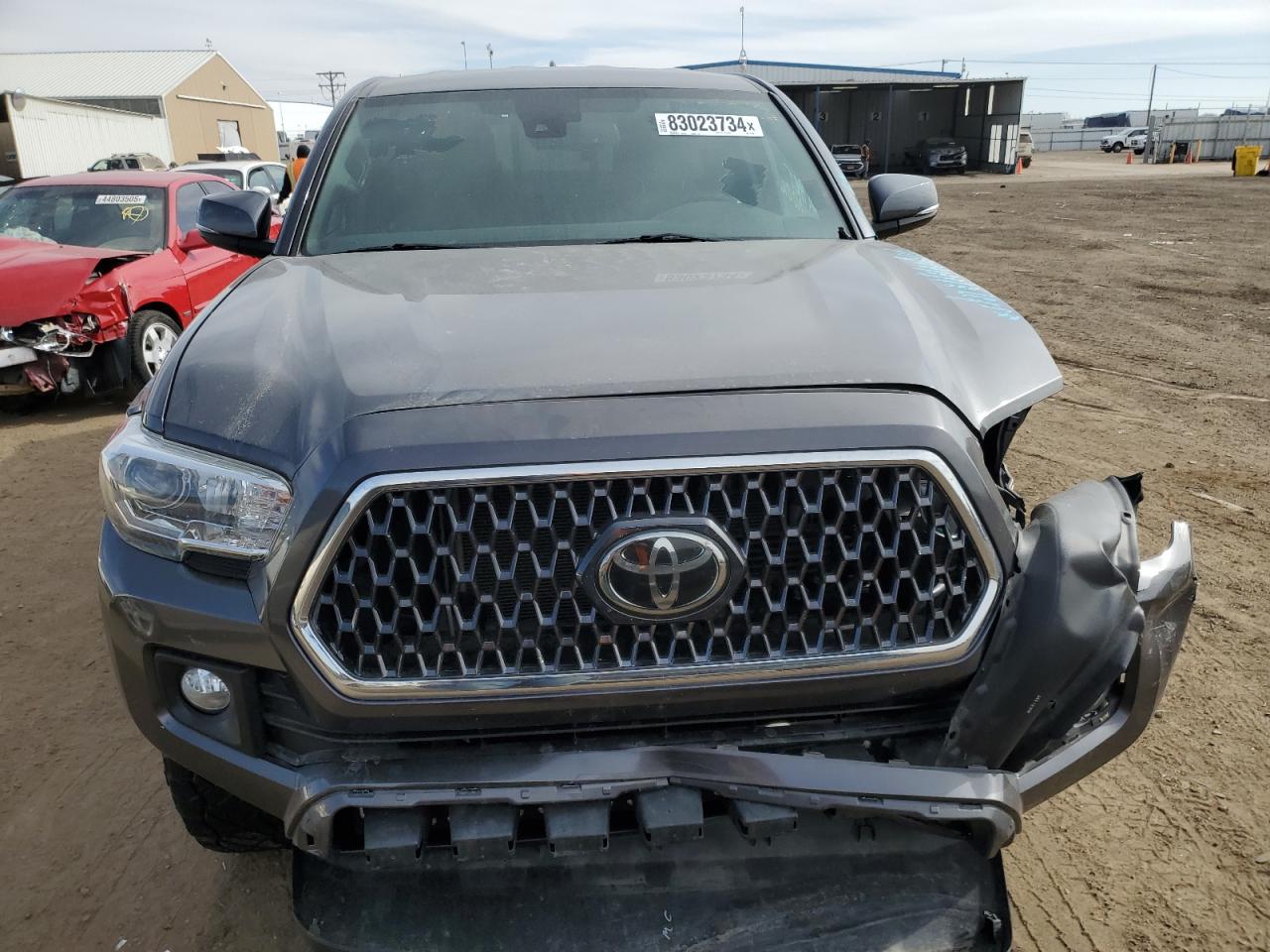 2019 Toyota Tacoma VIN 5TFSZ5AN2KX179674 Copart auction photo, front end / all over damage thumbnail 5