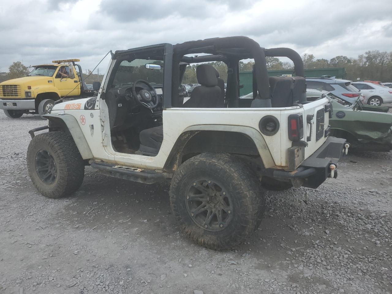 2011 Jeep Wrangler VIN 1J4AA2D12BL591296 Copart auction photo, burn - engine damage thumbnail 2