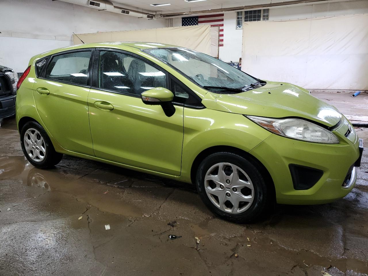 2013 Ford Fiesta VIN 3FADP4EJ4DM177469 Copart auction photo, front end / side damage thumbnail 4