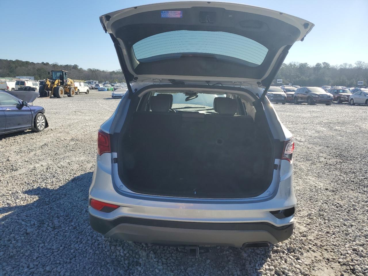 2018 Hyundai Santa Fe VIN 5XYZU3LB9JG556166 Copart auction photo, side / front end damage thumbnail 6