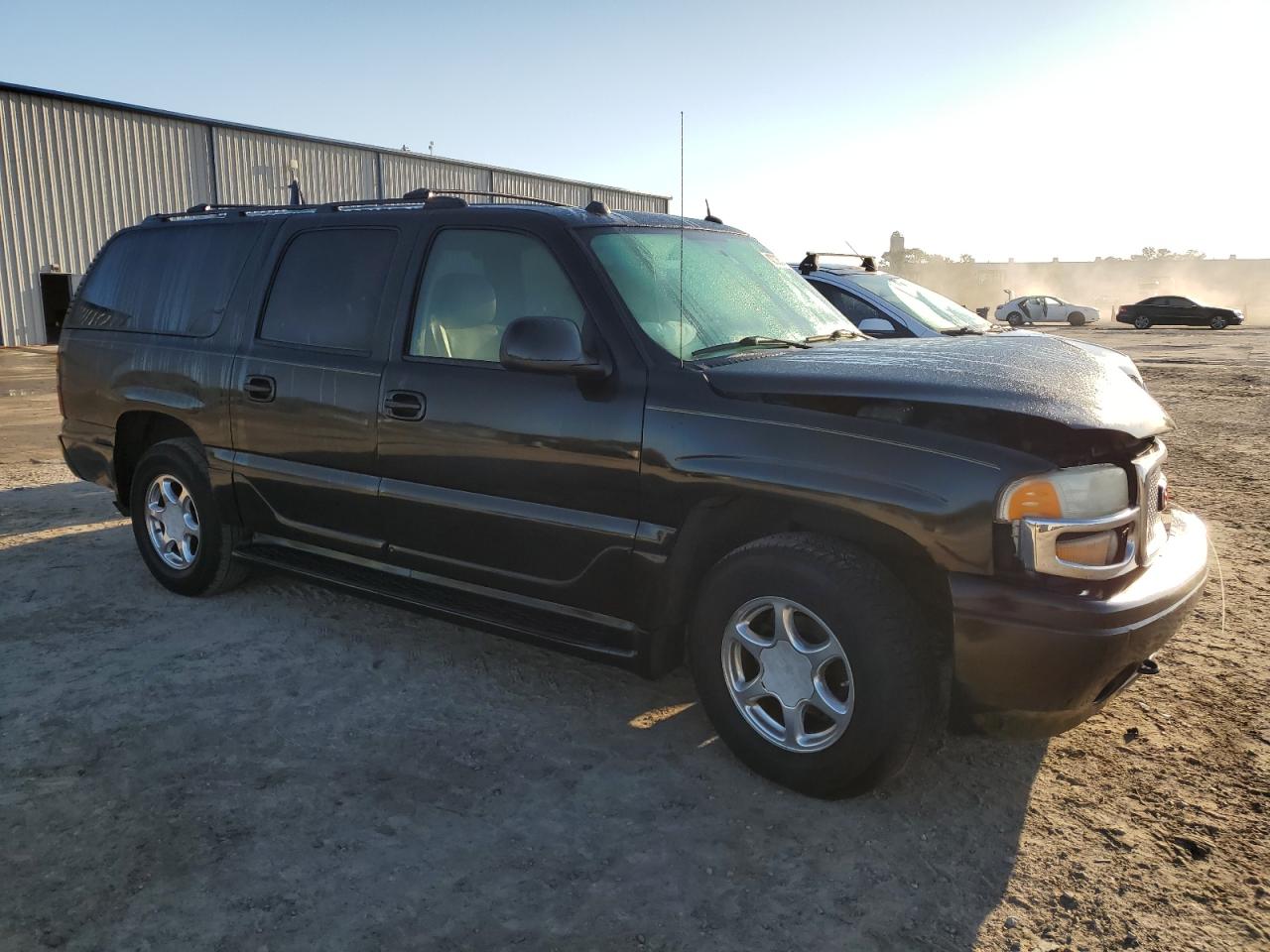 2005 GMC Yukon VIN 1GKFK66U95J242969 Copart auction photo, front end damage thumbnail 4