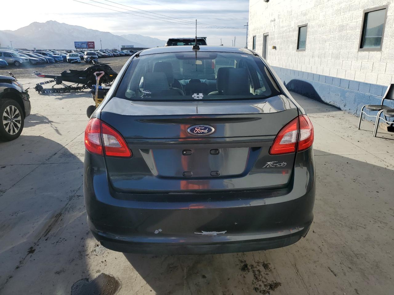 2011 Ford Fiesta VIN 3FADP4AJ2BM137958 Copart auction photo, all over damage thumbnail 6