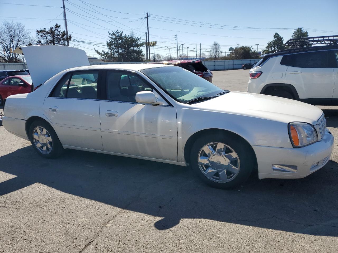 2000 Cadillac De Ville VIN 1G6KF5794YU244556 Copart auction photo, rear end damage thumbnail 4