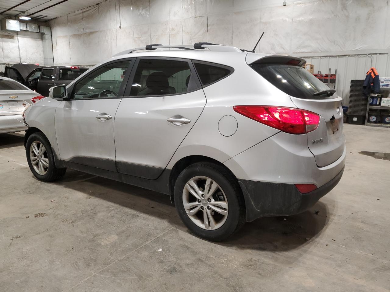 2012 Hyundai Tucson VIN KM8JUCAC6CU477561 Copart auction photo, front end / rear end damage thumbnail 2