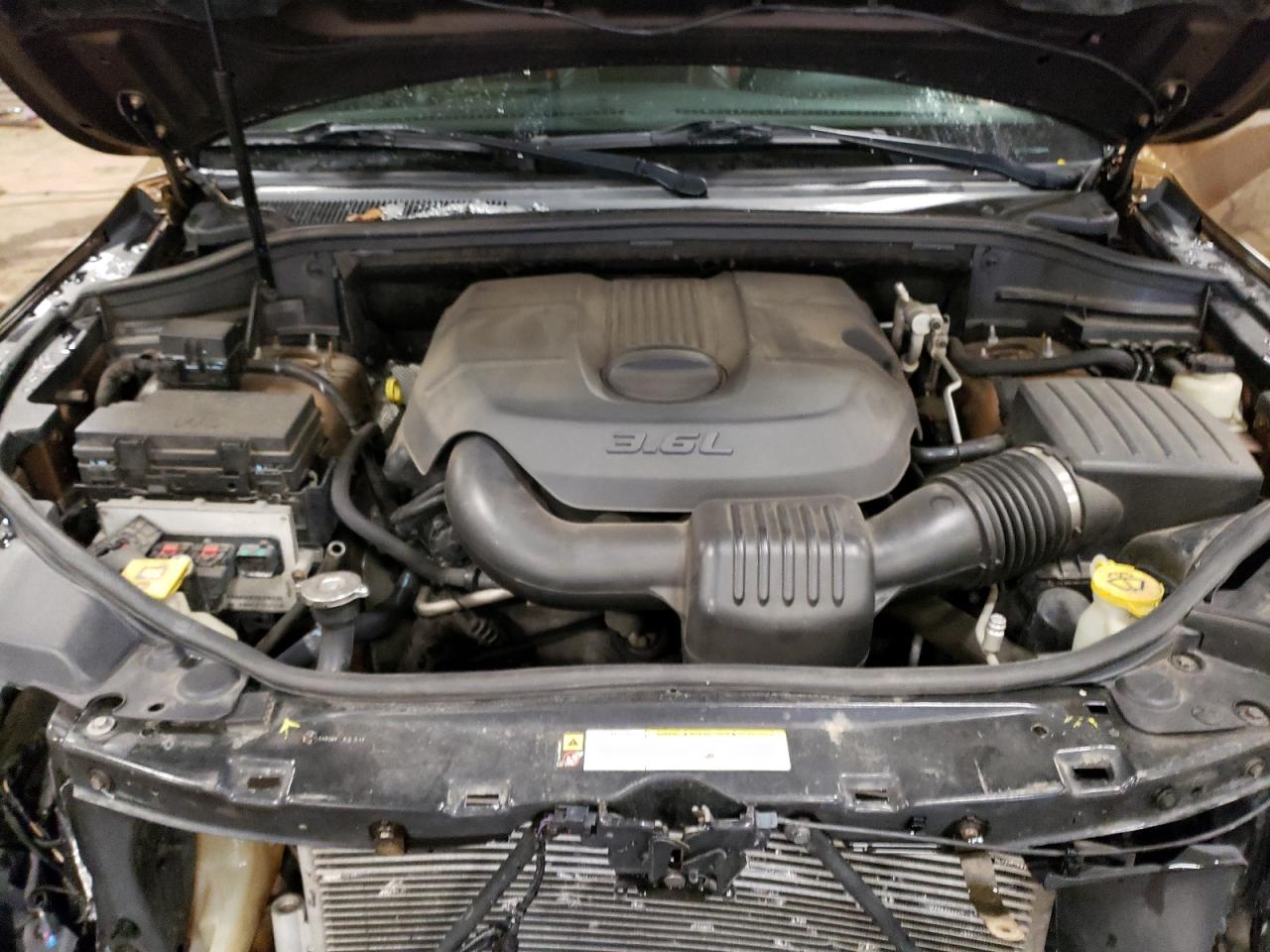 2011 Jeep Grand Cherokee VIN 1J4RR4GG2BC675304 Copart auction photo, front end damage thumbnail 12