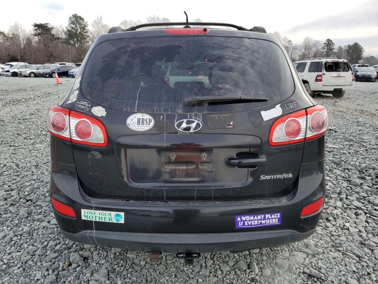 2011 Hyundai Santa Fe VIN 5XYZG4AG9BG056988 Copart auction photo, front end / minor dent/scratches damage thumbnail 6