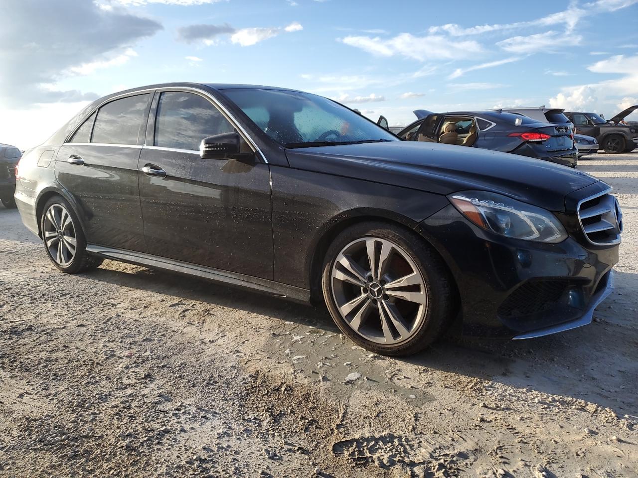 2016 Mercedes-Benz E-klasse VIN WDDHF5KB7GB244083 Copart auction photo, water/flood damage thumbnail 4