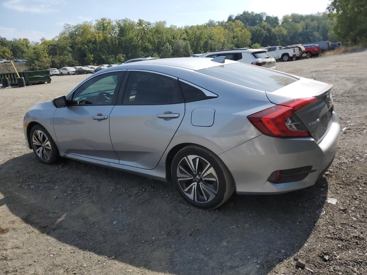 2017 Honda Civic VIN 2HGFC1F70HH659944 Copart auction photo, front end / side damage thumbnail 2