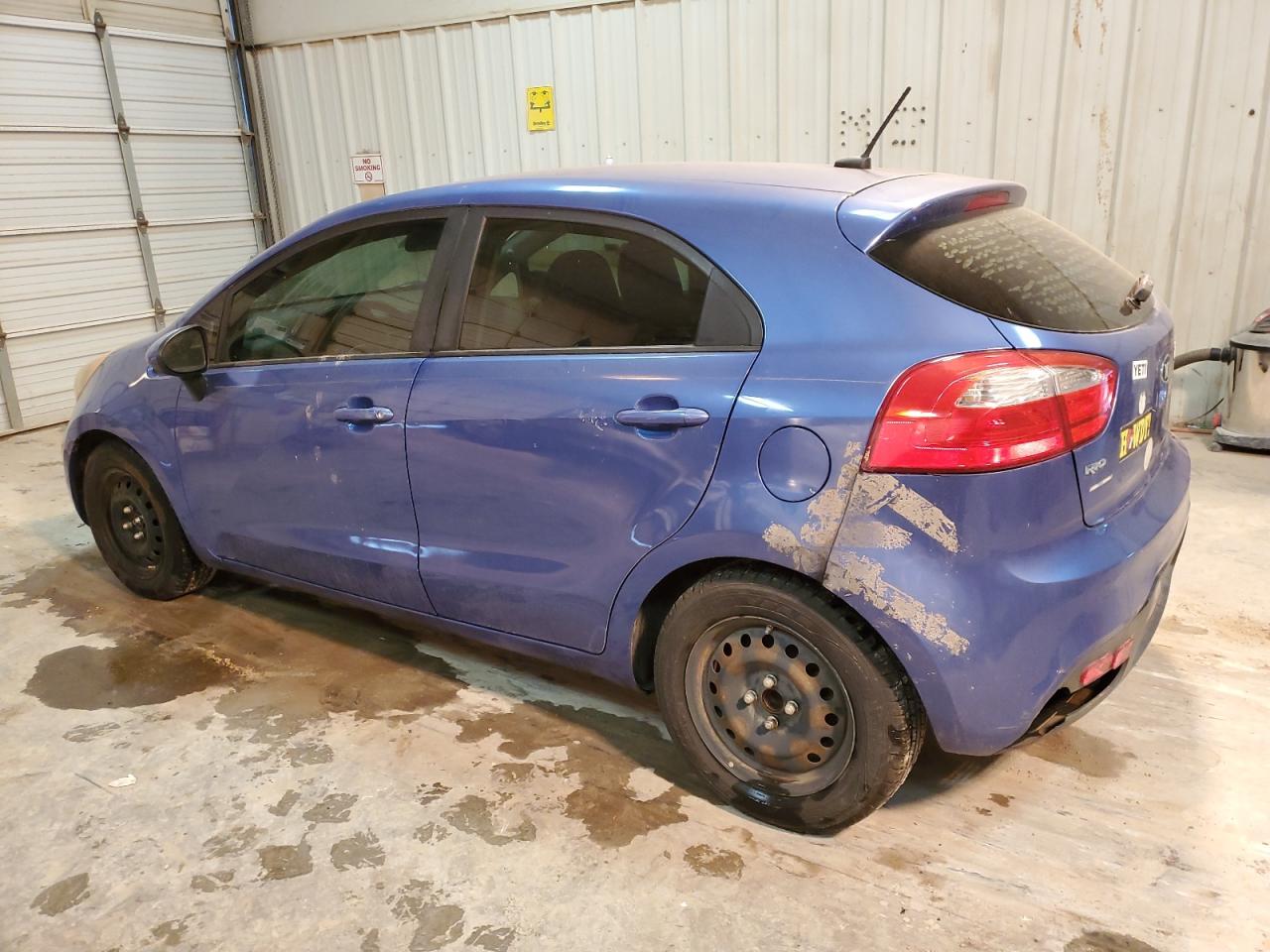 2013 KIA Rio VIN KNADN5A3XD6198689 Copart auction photo, minor dent/scratches / normal wear damage thumbnail 2