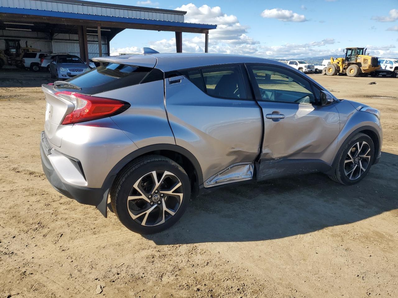 2018 Toyota C-HR VIN JTNKHMBX3J1011407 Copart auction photo, side damage thumbnail 3