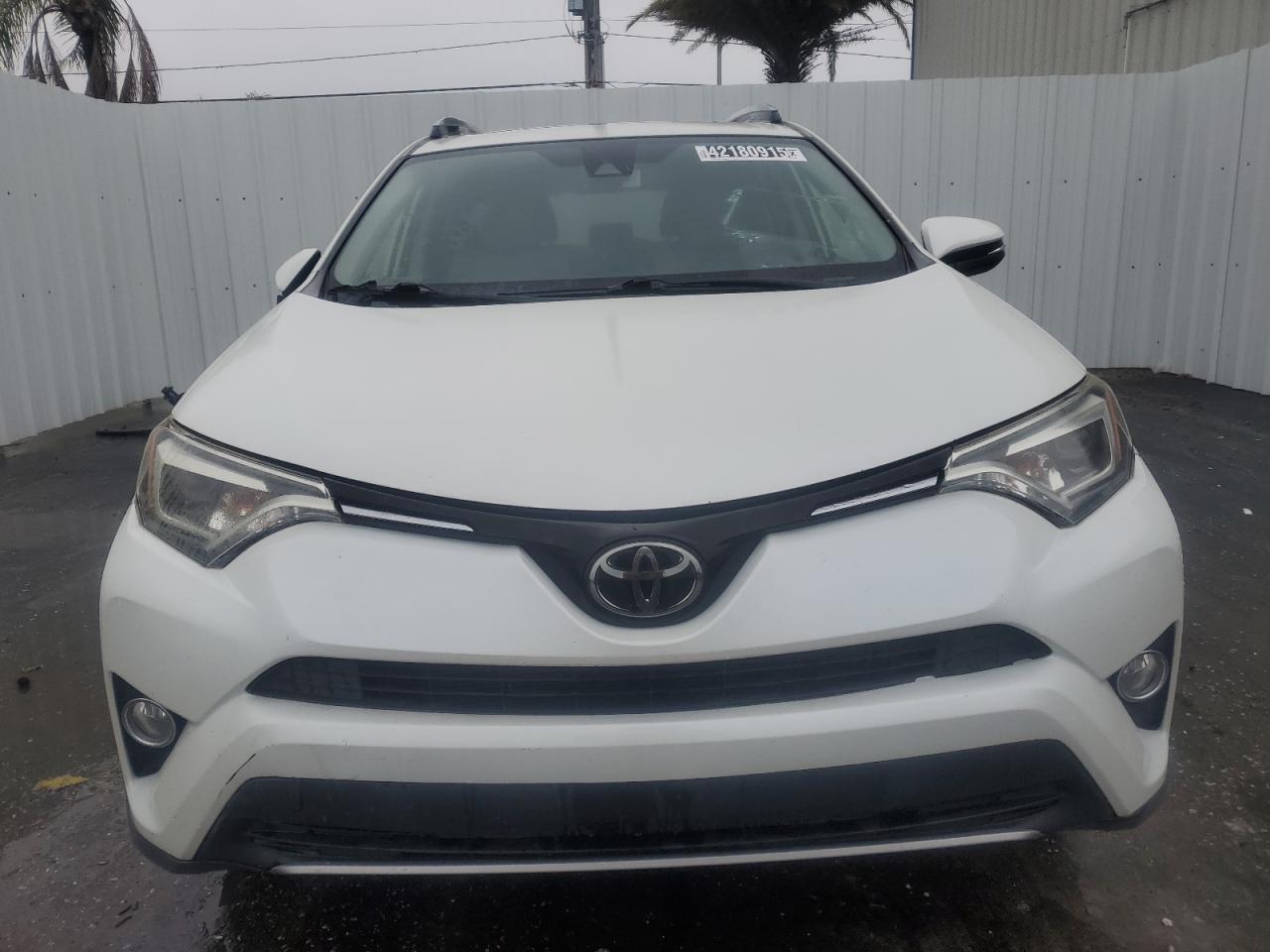 2018 Toyota RAV 4 VIN JTMYFREV3JD125983 Copart auction photo, rear end damage thumbnail 5