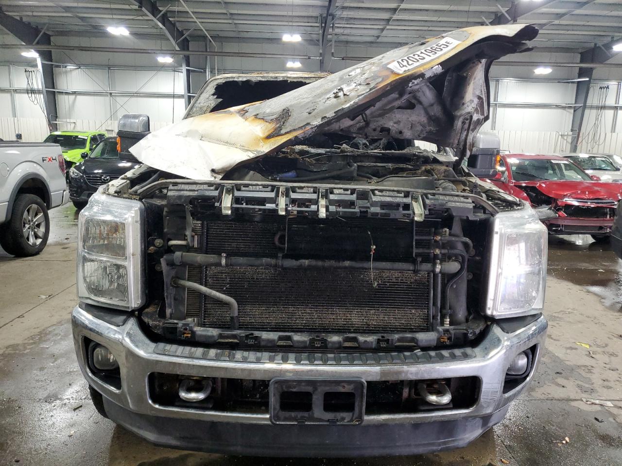 2011 Ford F350 VIN 1FT8W3BT5BEC99839 Copart auction photo, burn - interior damage thumbnail 5