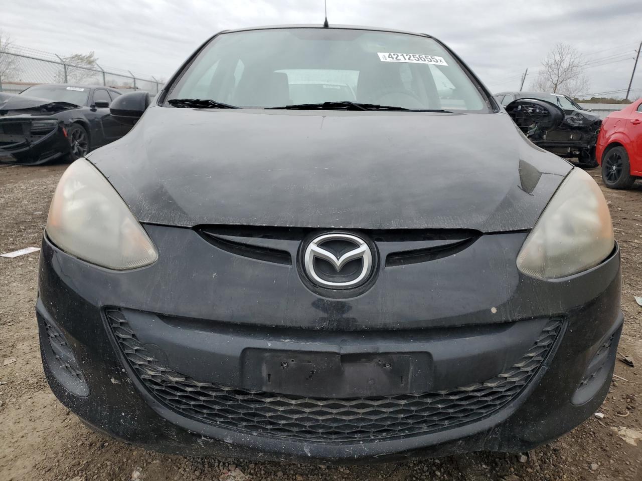 2012 Mazda 2 VIN JM1DE1KY9C0139821 Copart auction photo, side / front end damage thumbnail 5