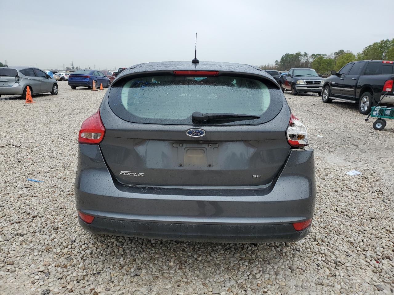 2017 Ford Focus VIN 1FADP3K2XHL318639 Copart auction photo, side / rear end damage thumbnail 6