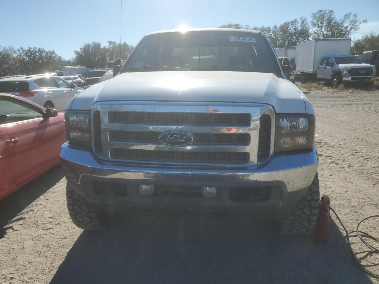 2003 Ford F350 VIN 1FTSW31P23EC64980 Copart auction photo, side / undercarriage damage thumbnail 5