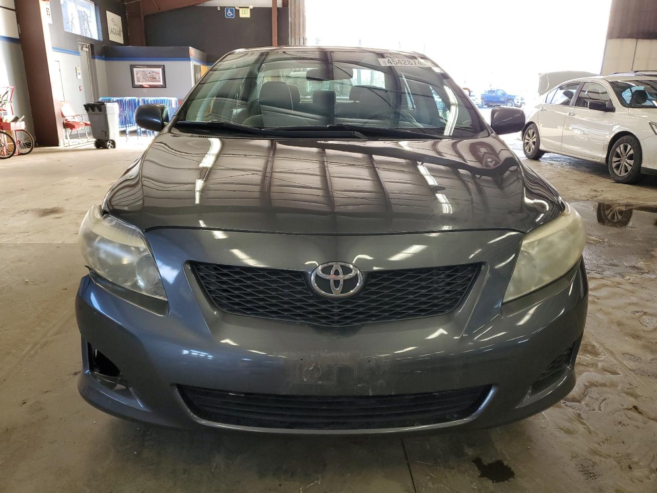 2009 Toyota Corolla VIN JTDBL40E999028150 Copart auction photo, front end / side damage thumbnail 5