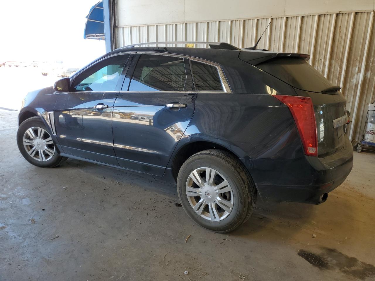 2014 Cadillac SRX VIN 3GYFNBE30ES530537 Copart auction photo, front end / undercarriage damage thumbnail 2