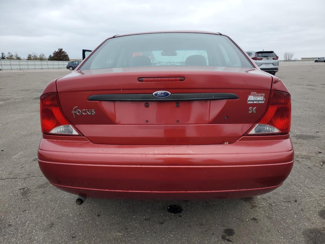 2004 Ford Focus VIN 1FAFP34344W198912 Copart auction photo, all over damage thumbnail 6