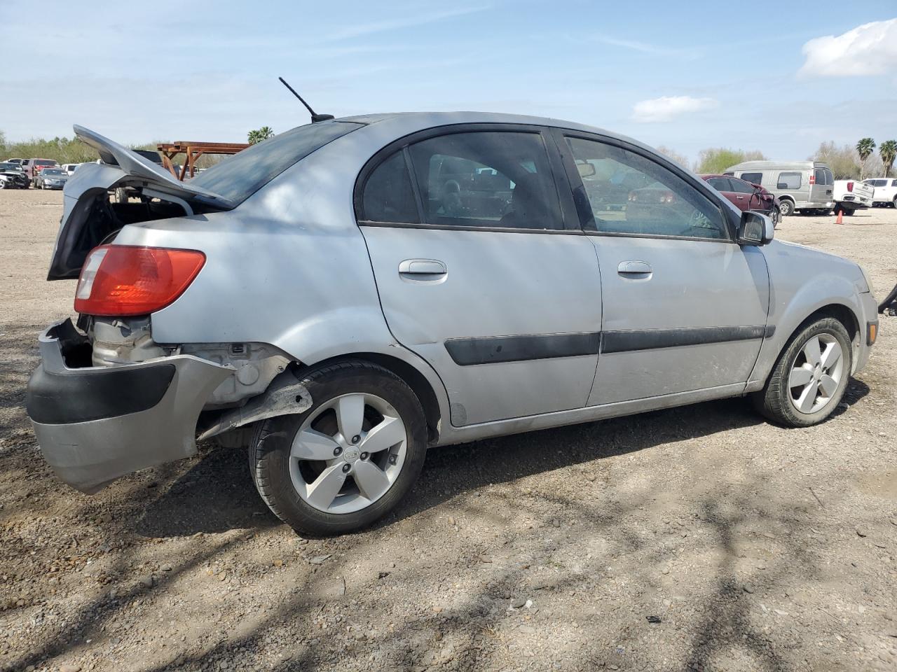 2009 KIA Rio VIN KNADE223696556441 Copart auction photo, rear end damage thumbnail 3