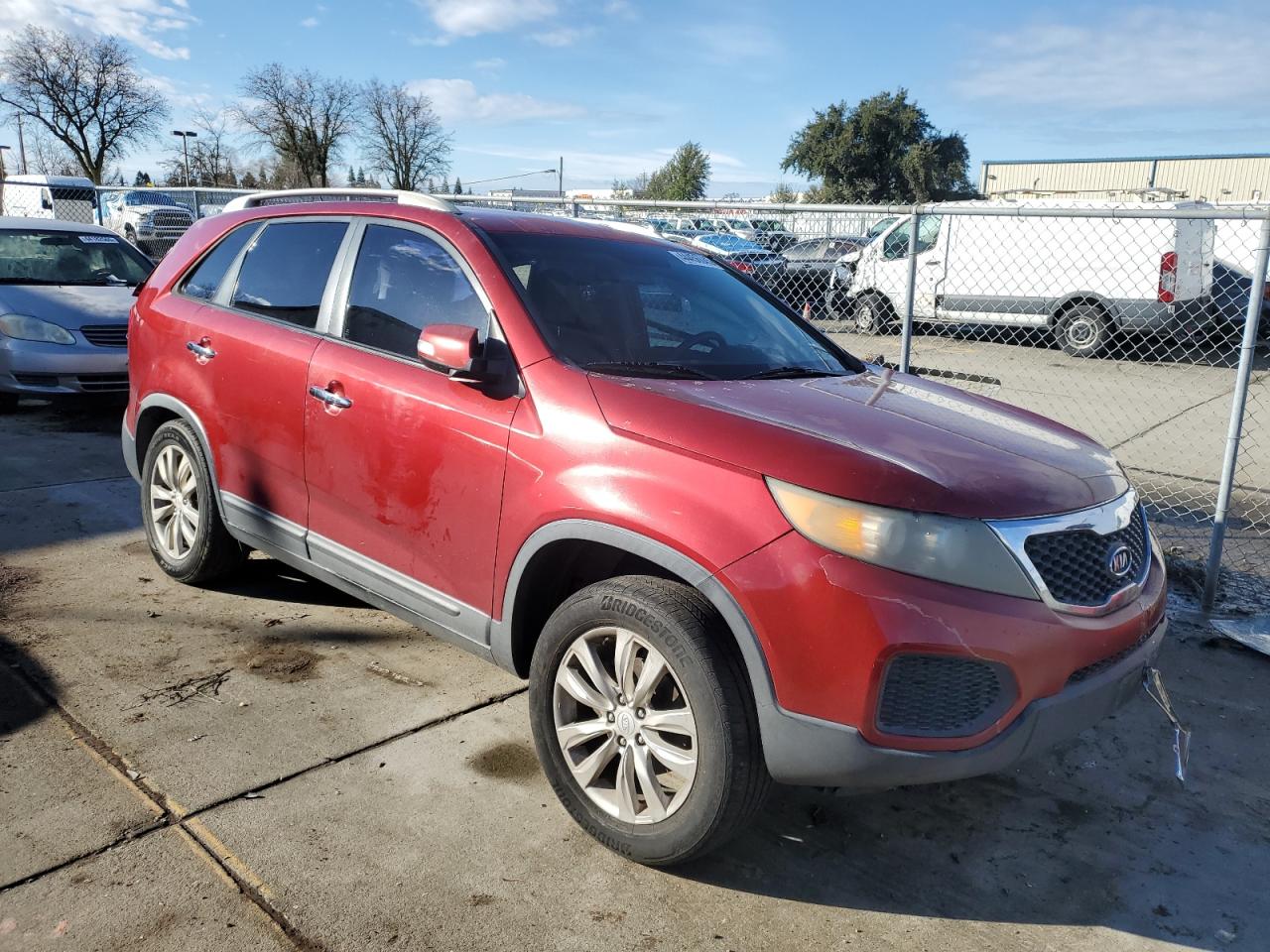 2011 KIA Sorento VIN 5XYKT4A23BG083170 Copart auction photo, side / rear end damage thumbnail 4