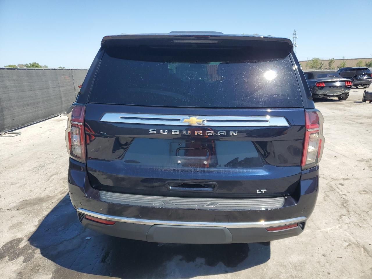 2021 Chevrolet Suburban VIN 1GNSCCKD7MR136894 Copart auction photo, side / rear end damage thumbnail 6