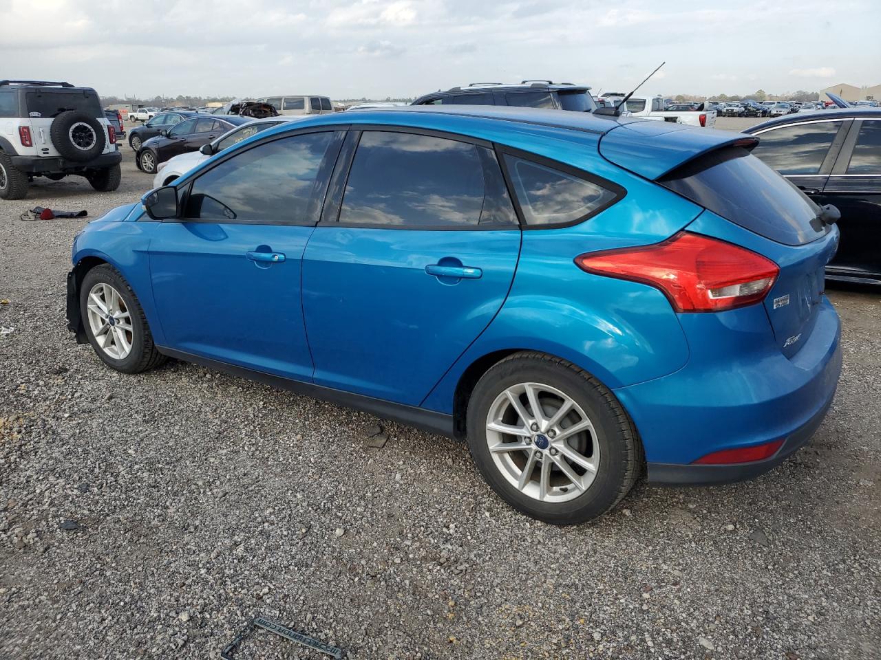2016 Ford Focus VIN 1FADP3K22GL244969 Copart auction photo, front end / minor dent/scratches damage thumbnail 2