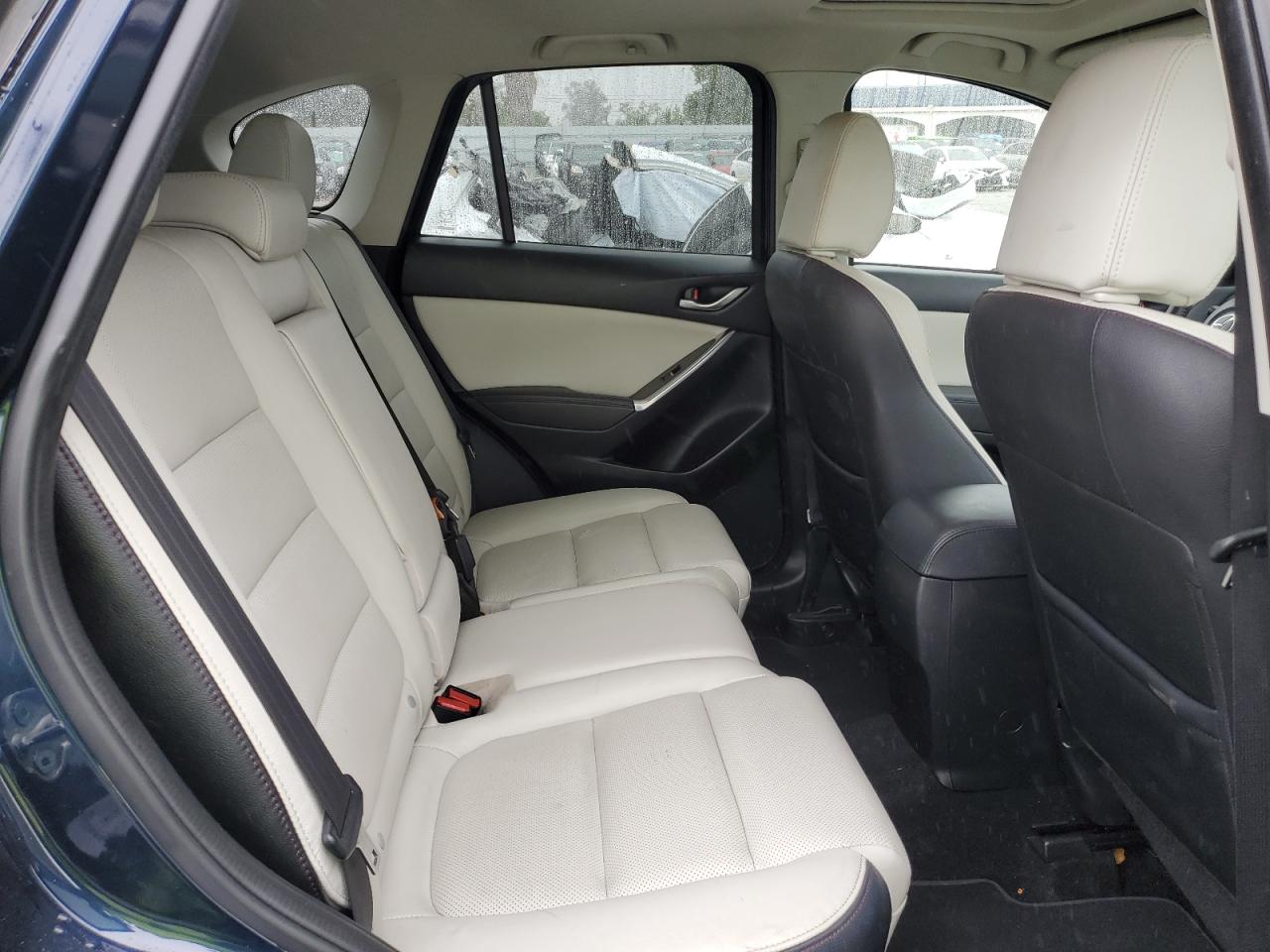 2016 Mazda CX-5 VIN JM3KE4DY9G0783581 Copart auction photo, burn / minor dent/scratches damage thumbnail 11