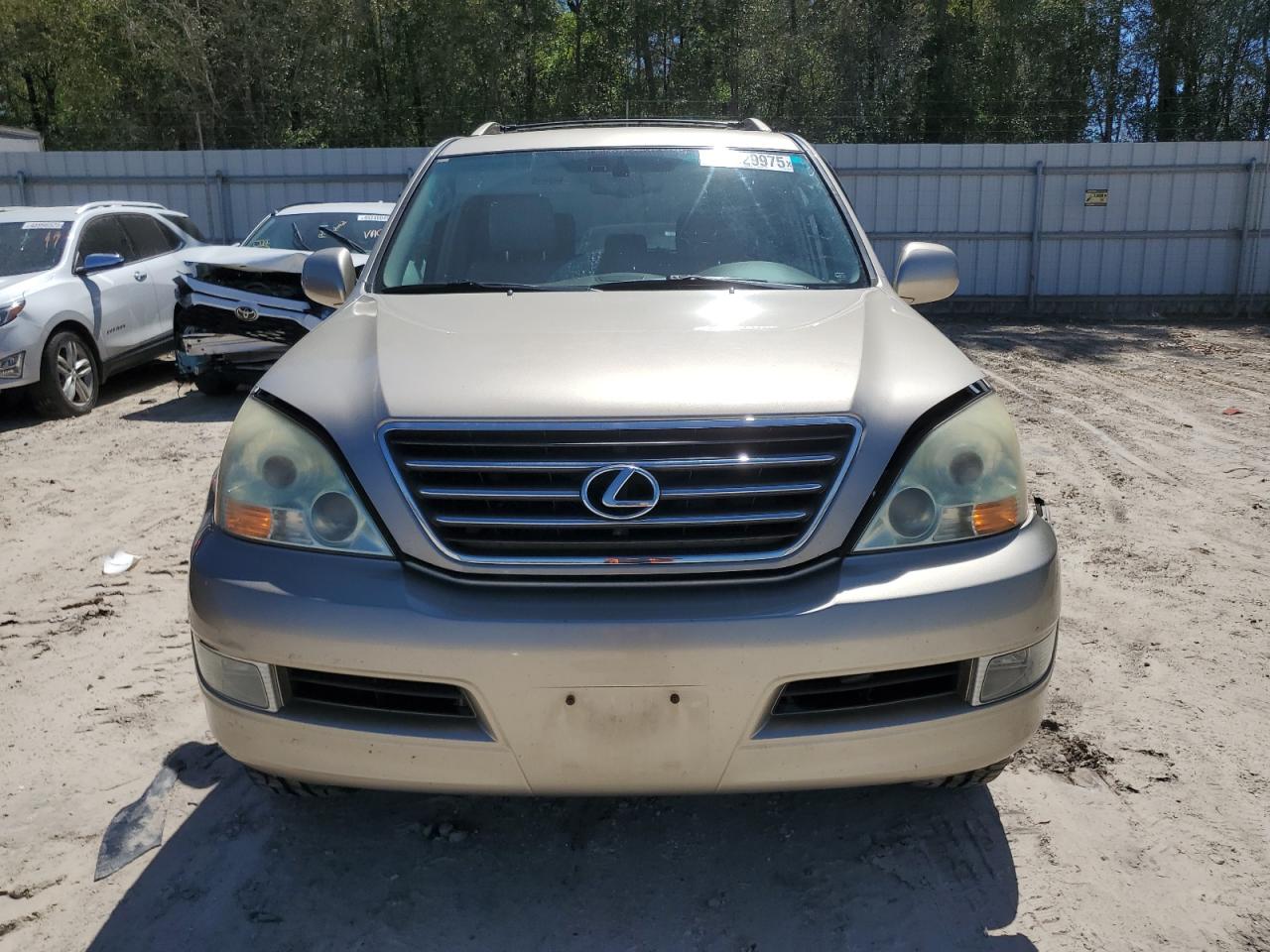 2005 Lexus GX VIN JTJBT20X550083549 Copart auction photo, side damage thumbnail 5