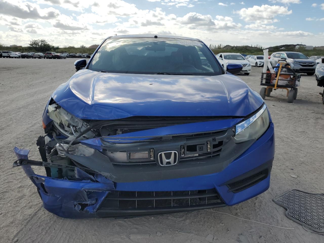 2016 Honda Civic VIN 2HGFC4B09GH310872 Copart auction photo, front end damage thumbnail 5