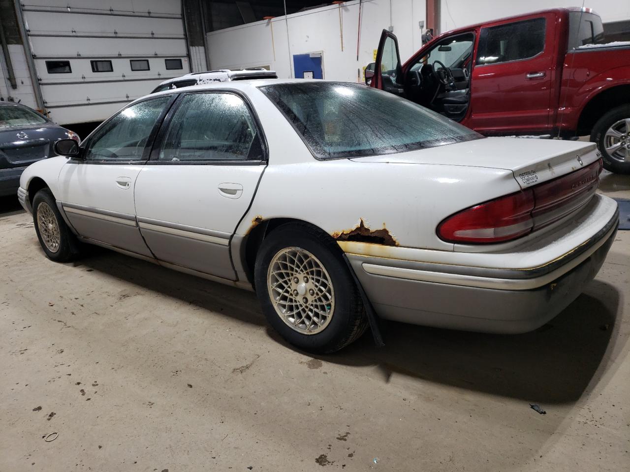 1993 Chrysler Concorde VIN 2C3EL56T1PH575522 Copart auction photo, undercarriage / mechanical damage thumbnail 2