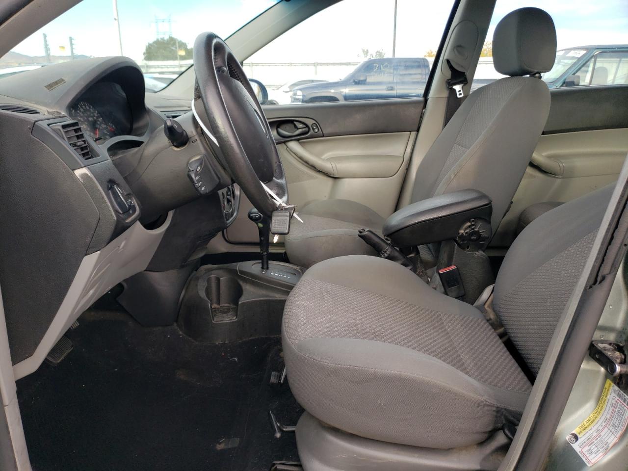 2005 Ford Focus VIN 3FAFP37N65R156999 Copart auction photo, rear end / hail damage thumbnail 7