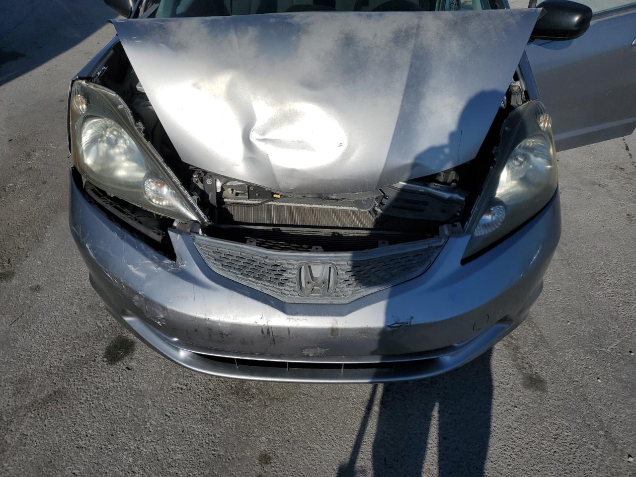 2010 Honda Fit VIN JHMGE8H21AS012909 Copart auction photo, front end / side damage thumbnail 12