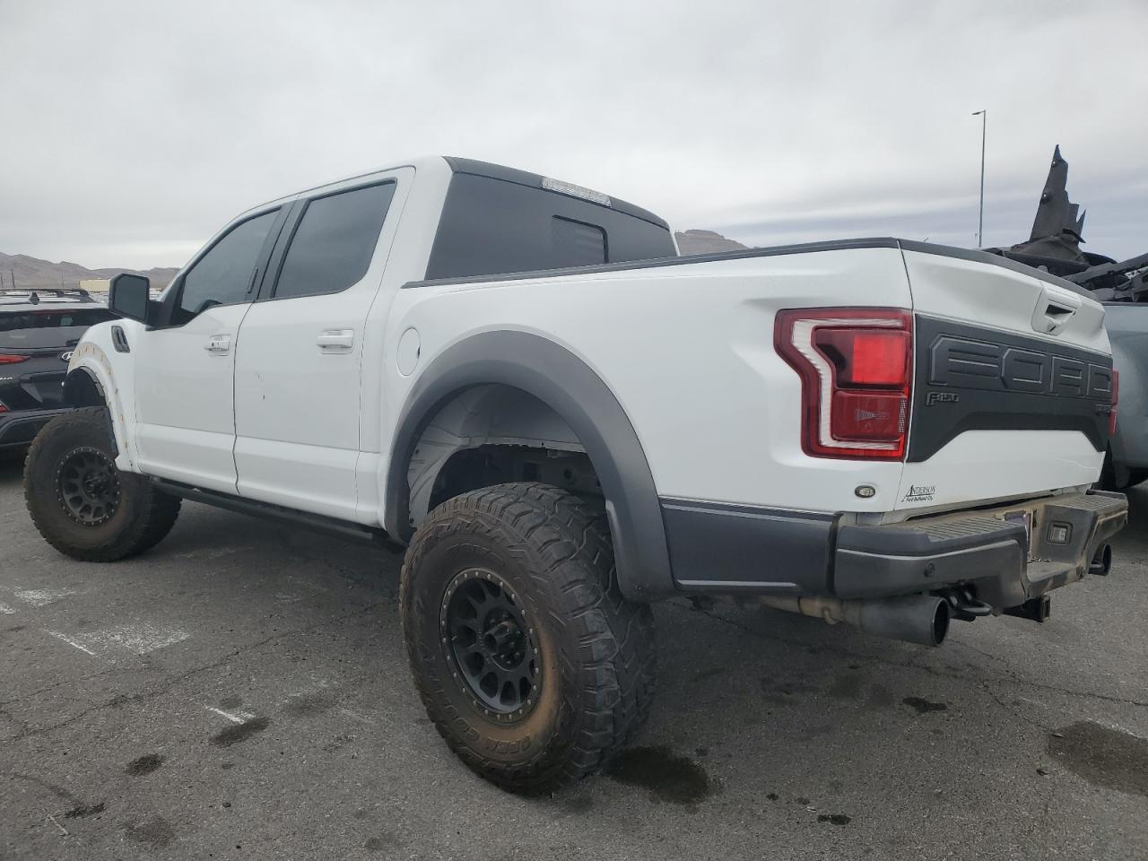 2020 Ford F-150 VIN 1FTFW1RG0LFC23574 Copart auction photo, front end / side damage thumbnail 2