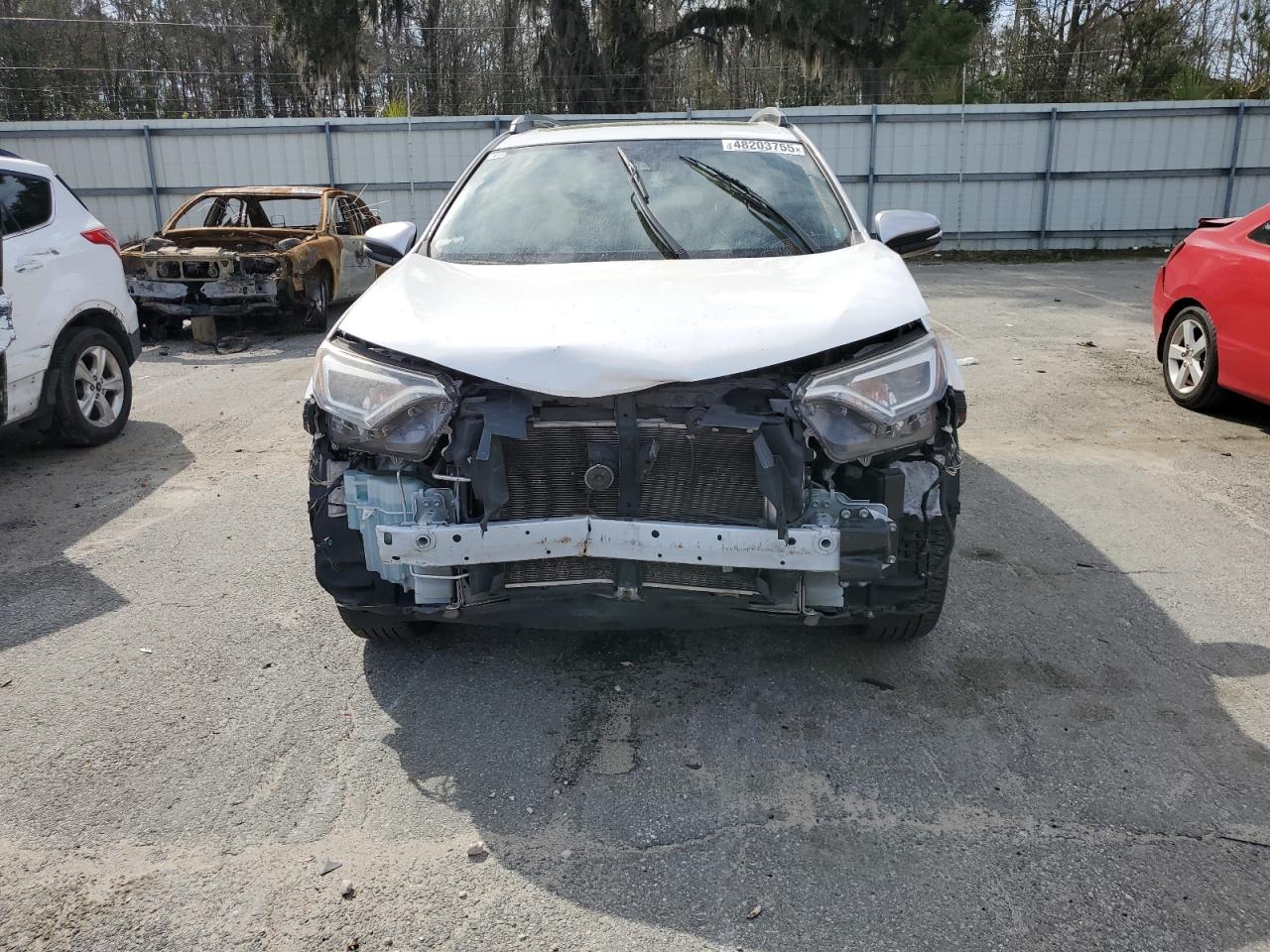 2018 Toyota RAV 4 VIN 2T3JFREV3JW706033 Copart auction photo, front end damage thumbnail 5