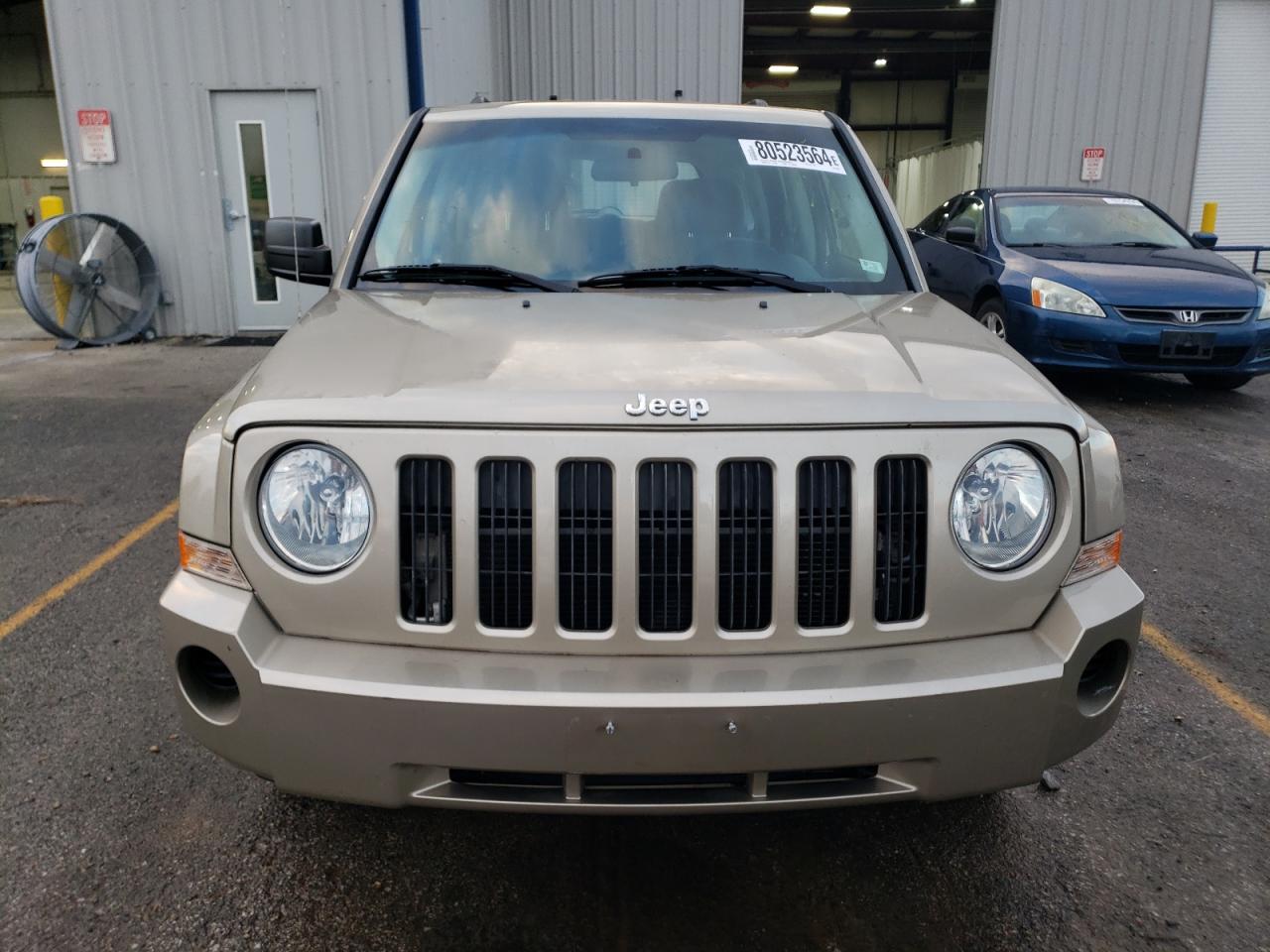 2010 Jeep Liberty (Patriot) VIN 1J4NF2GB2AD500530 Copart auction photo, side damage thumbnail 5