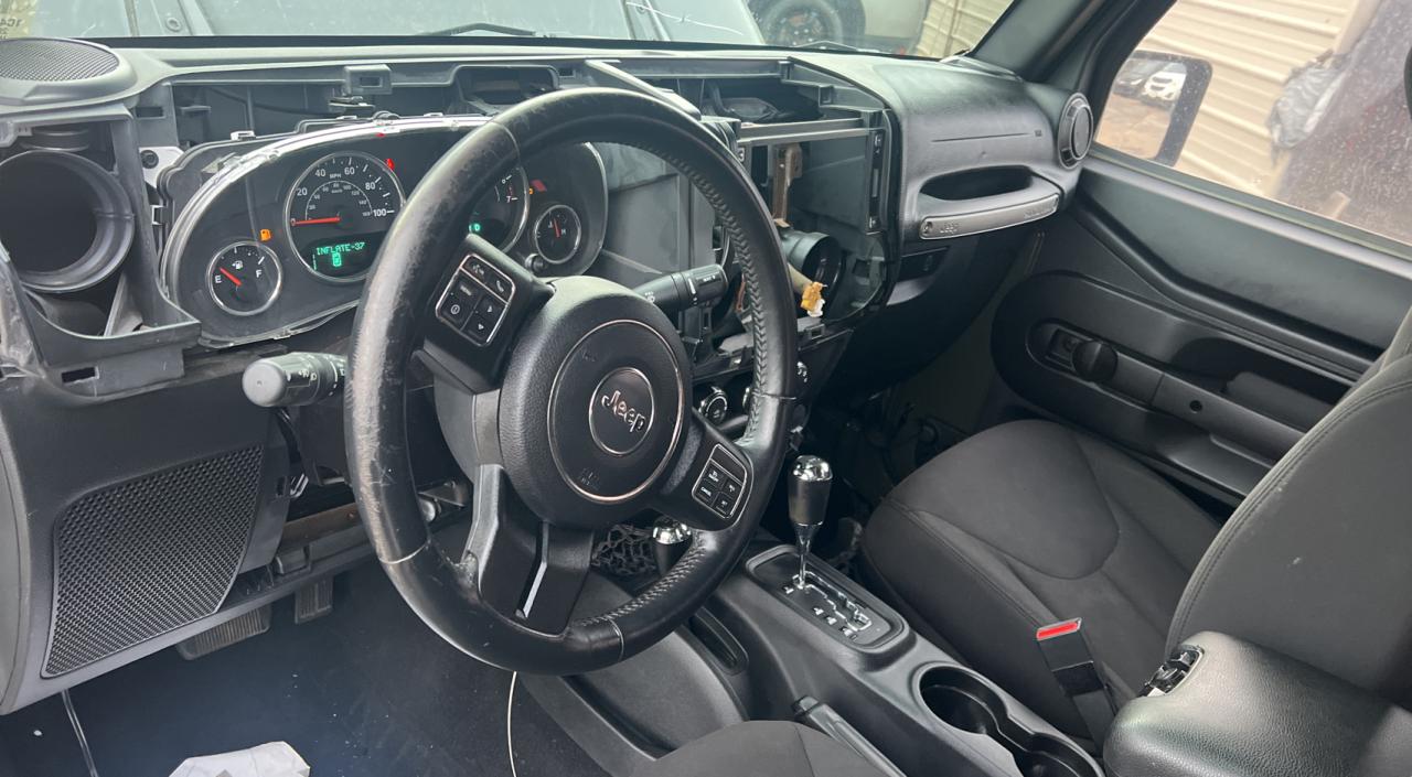 2015 Jeep Wrangler VIN 1C4AJWAG9FL718797 Copart auction photo, all over / vandalism damage thumbnail 9