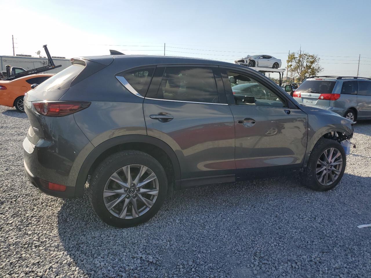 2020 Mazda CX-5 VIN JM3KFADM1L0782928 Copart auction photo, front end / side damage thumbnail 3