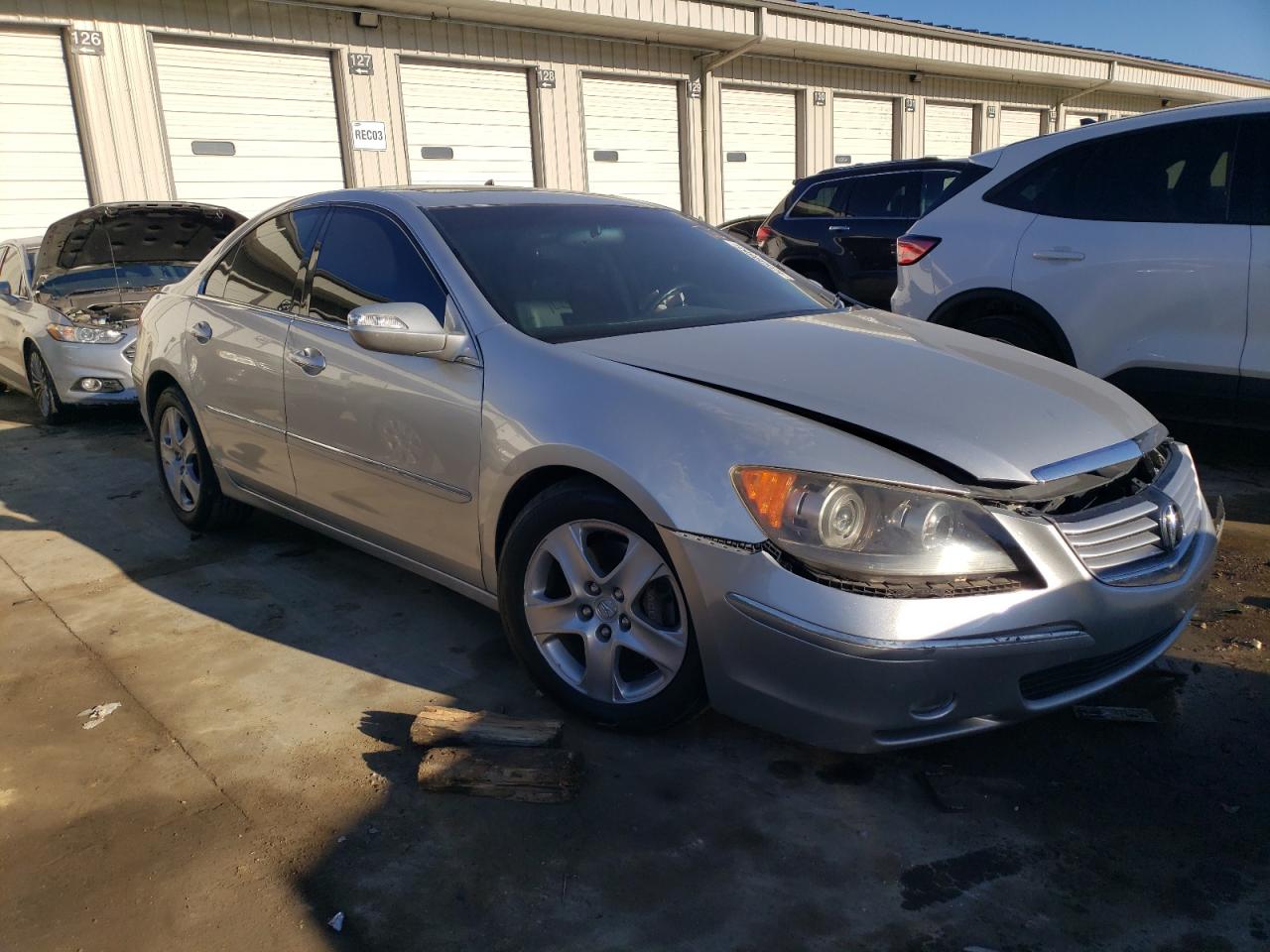 2005 Acura RL VIN JH4KB16555C001760 Copart auction photo, front end / side damage thumbnail 4