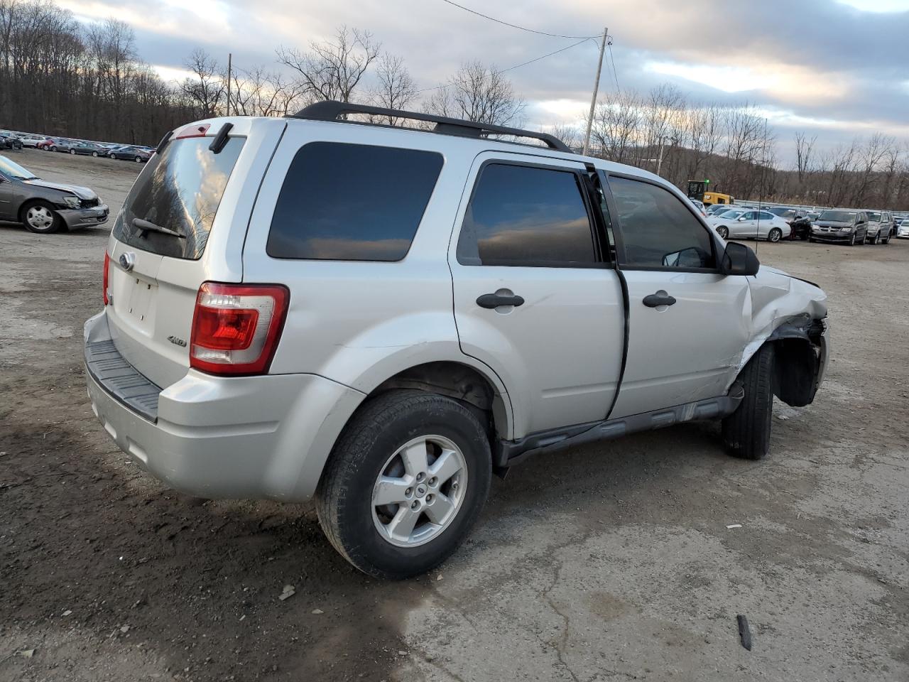 2009 Ford Escape VIN 1FMCU93789KA19410 Copart auction photo, side / front end damage thumbnail 3