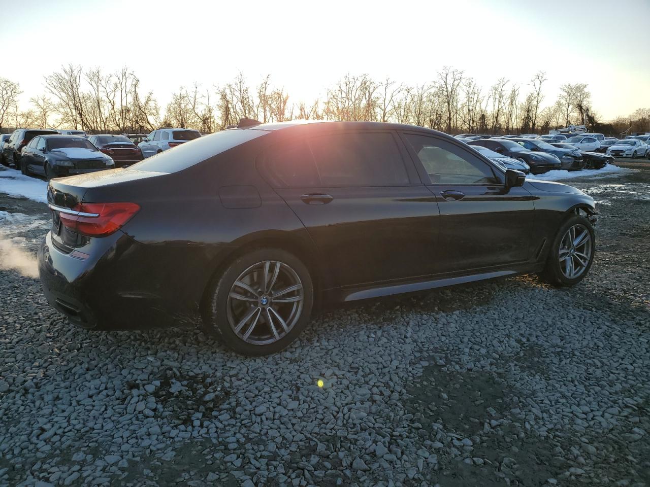 2016 BMW 7er VIN WBA7E2C59GG547530 Copart auction photo, front end / minor dent/scratches damage thumbnail 3