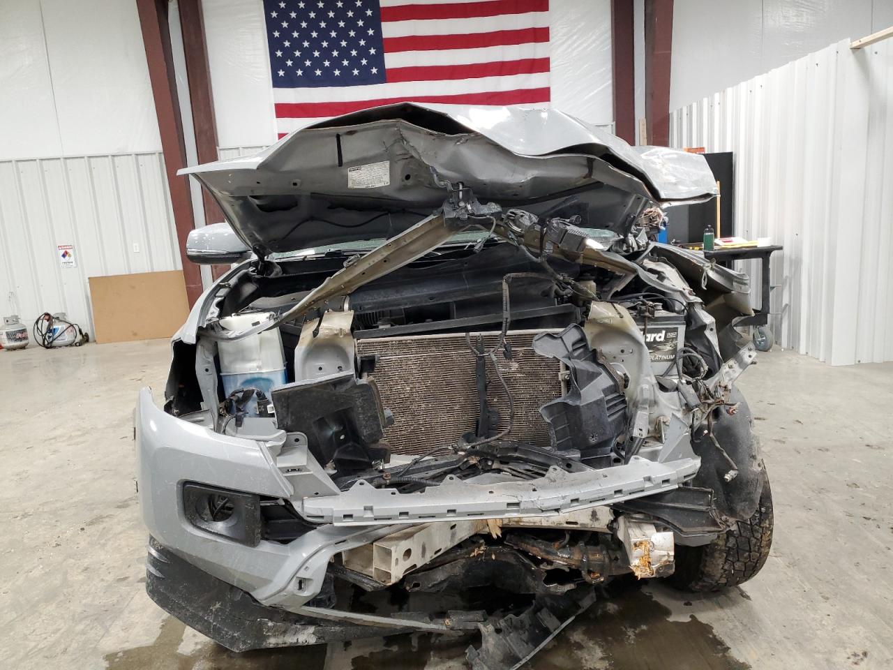 2018 Toyota Tacoma VIN 5TFCZ5AN8JX132877 Copart auction photo, front end damage thumbnail 5