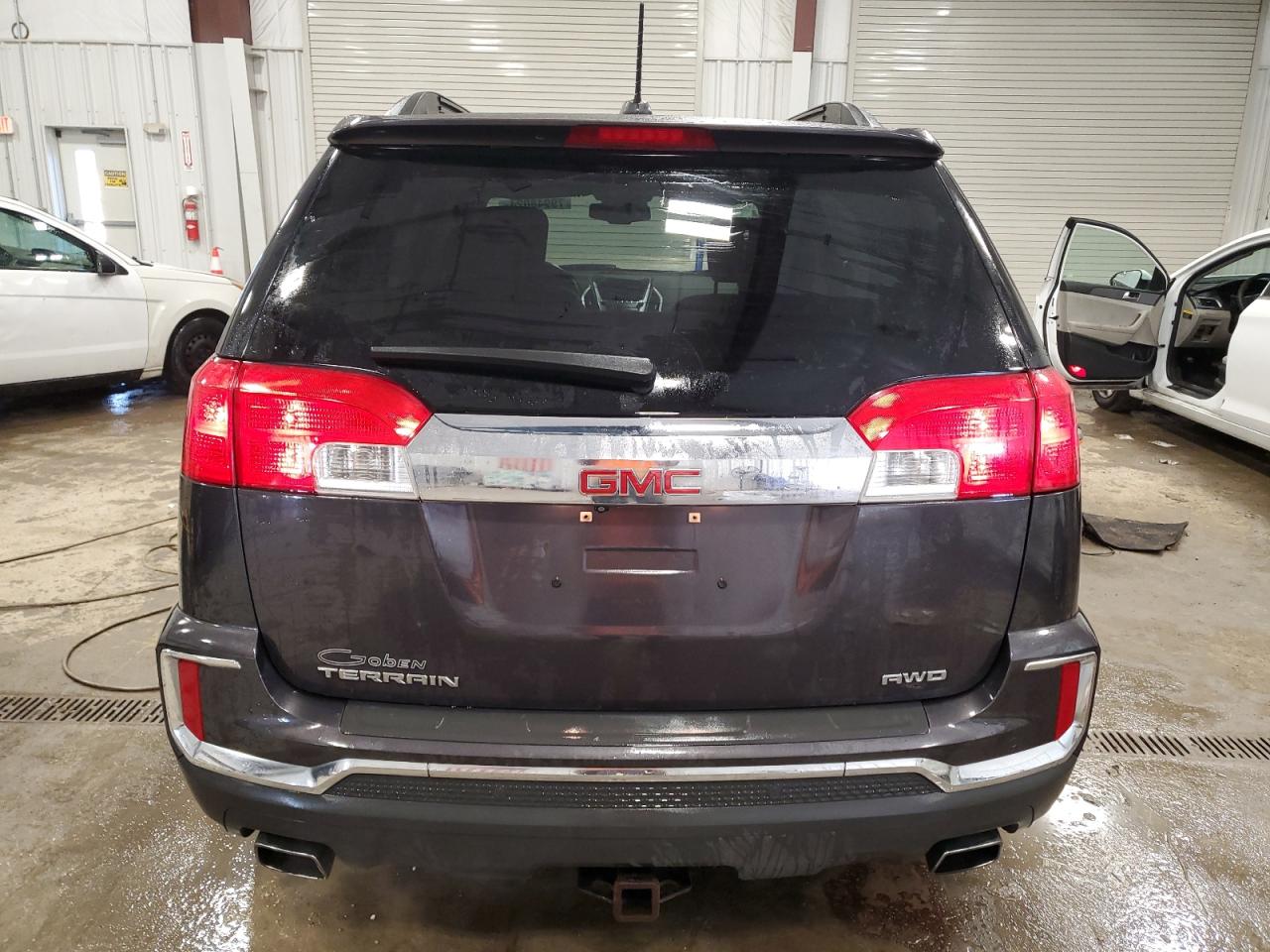 2016 GMC Terrain VIN 2GKFLUE31G6257539 Copart auction photo, front end / side damage thumbnail 6