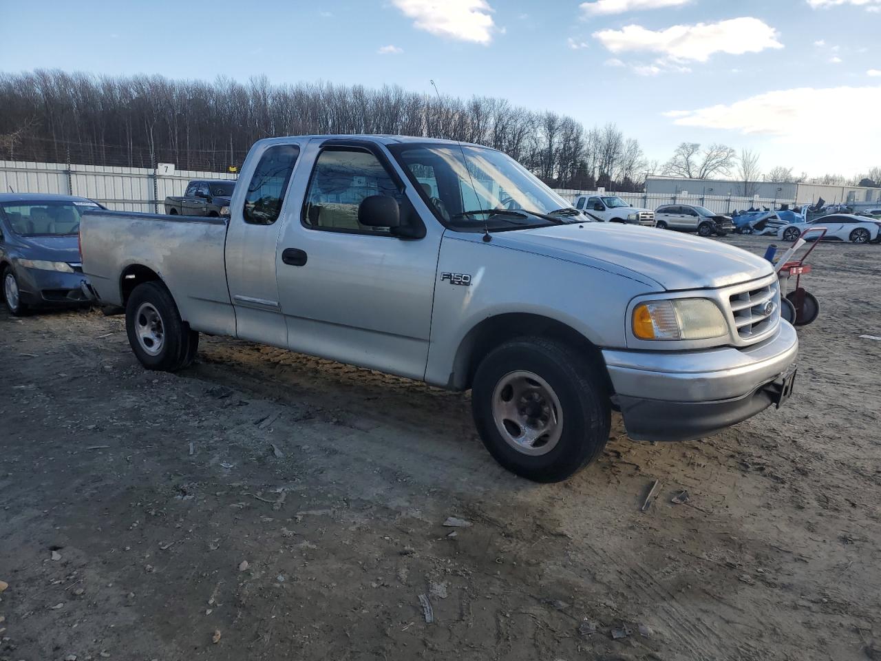 2003 Ford F-150 VIN 1FTRX17273NA68576 Copart auction photo, rear end / minor dent/scratches damage thumbnail 4