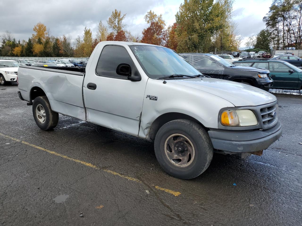 2003 Ford F-150 VIN 2FTRF17223CA49961 Copart auction photo, side / front end damage thumbnail 4