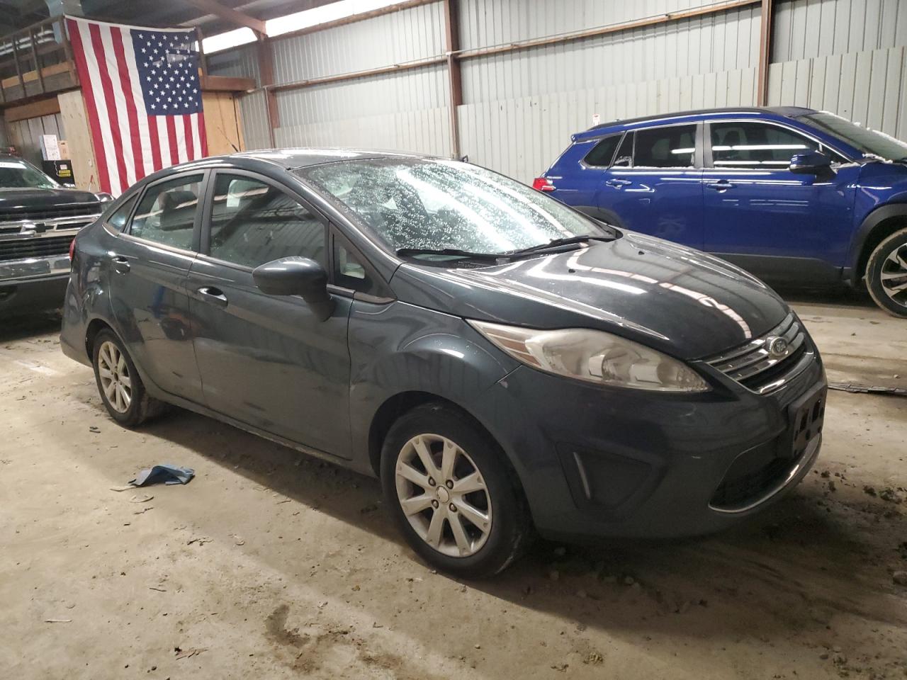 2011 Ford Fiesta VIN 3FADP4BJ6BM137332 Copart auction photo, rear end damage thumbnail 4