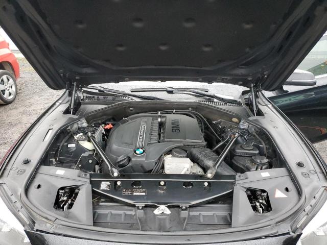 2014 BMW 7er VIN WBAYF4C59ED281857 Copart auction photo, side / rear end damage thumbnail 11