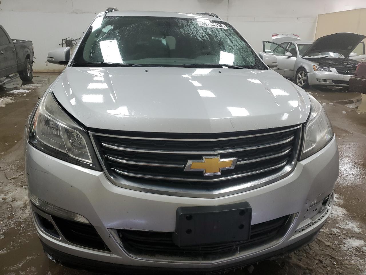 2017 Chevrolet Traverse VIN 1GNKVHKD5HJ112914 Copart auction photo, side / front end damage thumbnail 5
