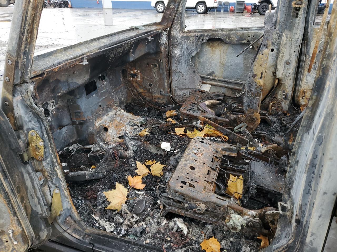 2010 Jeep Wrangler VIN 1J4BA6H12AL116672 Copart auction photo, burn damage thumbnail 7