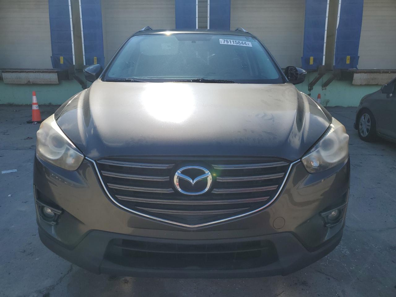 2016 Mazda CX-5 VIN JM3KE2CY6G0832211 Copart auction photo, minor dent/scratches damage thumbnail 5
