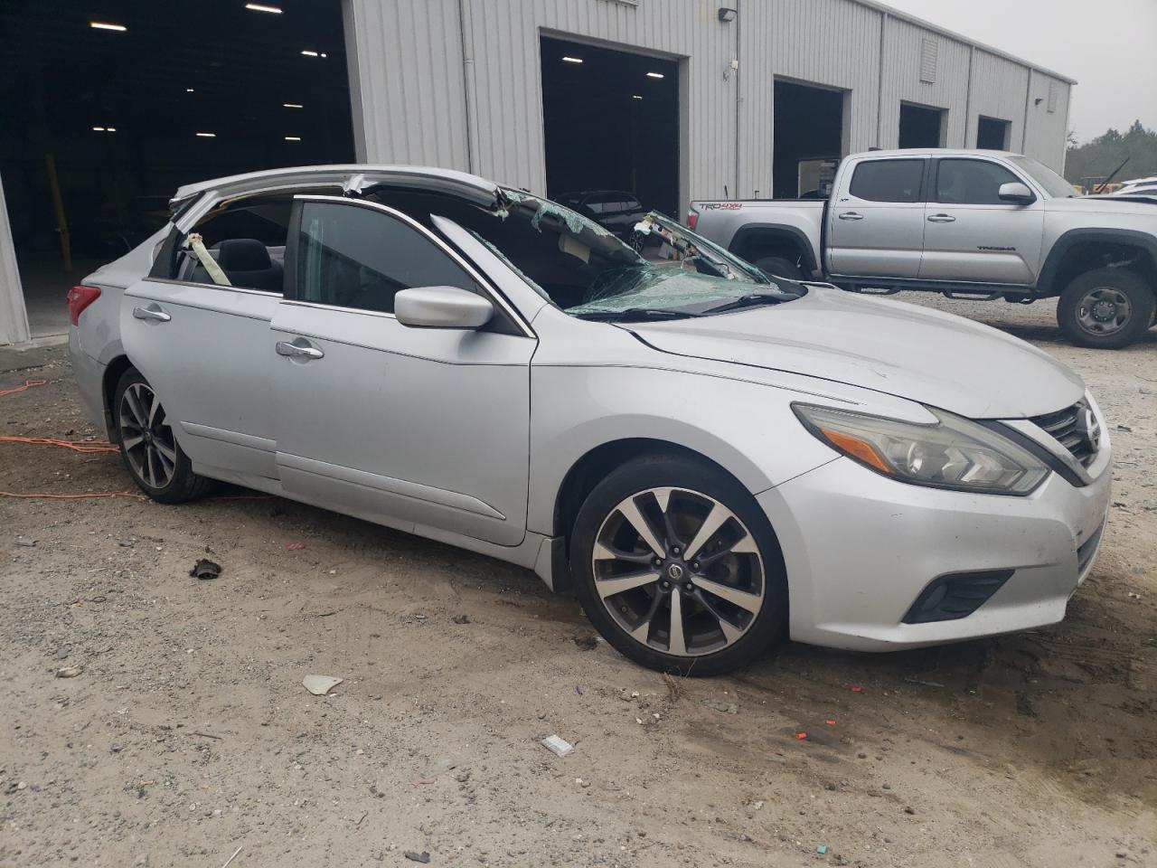 2016 Nissan Altima VIN 1N4AL3AP6GN334349 Copart auction photo, all over damage thumbnail 4